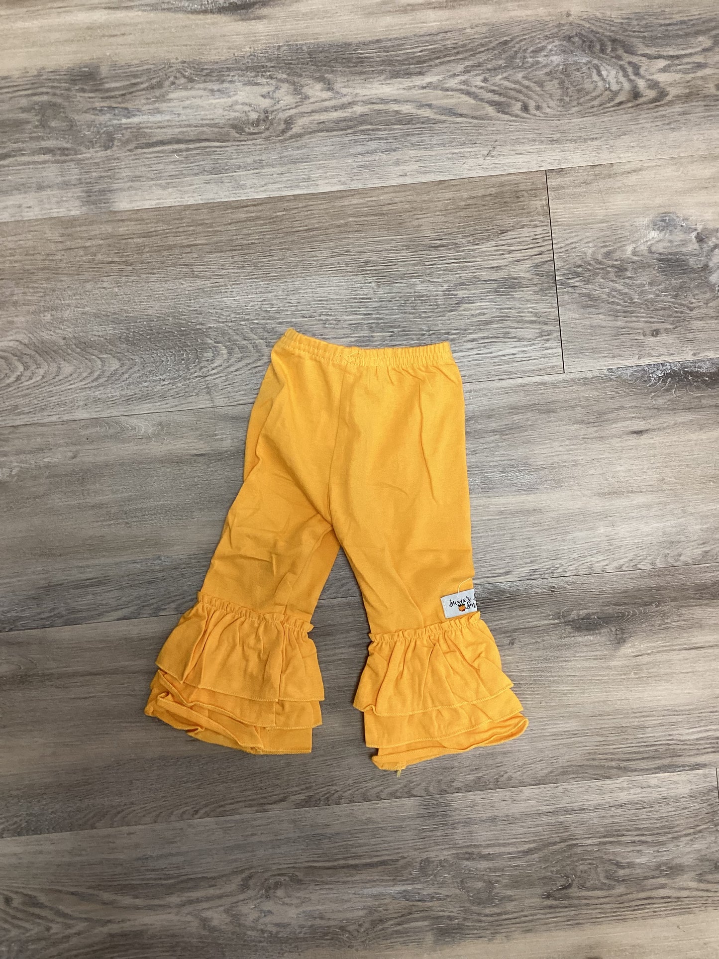Orange ruffled leggings