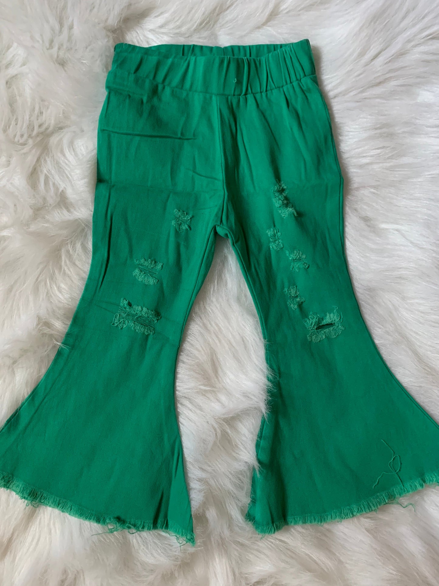 Teal green distressed denim